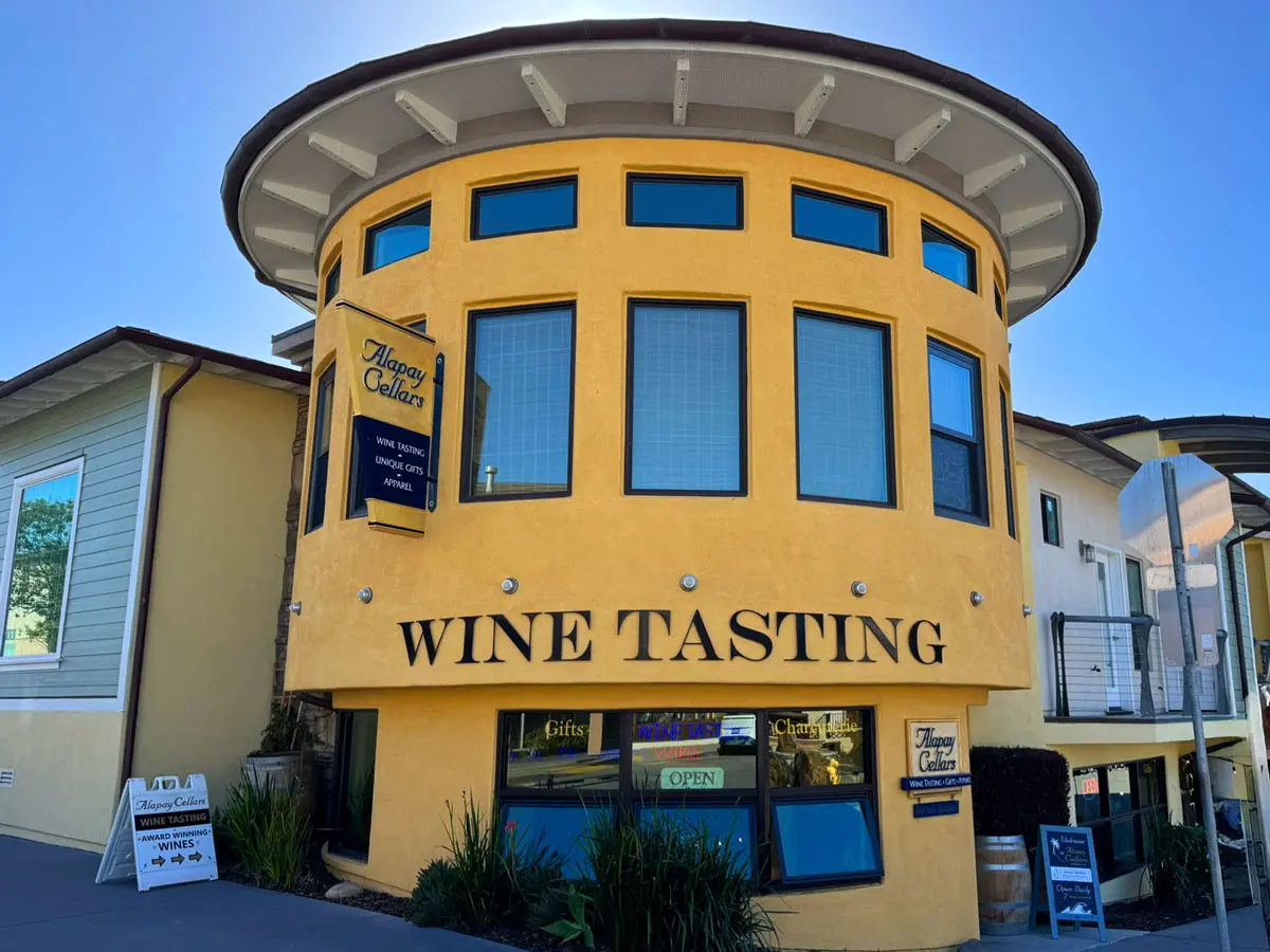 allapay-cellars The Alapay Cellars tasting room, a yellow round-fronted building with WINE TASTING lettered across it and an A-board advertising award-winning wines